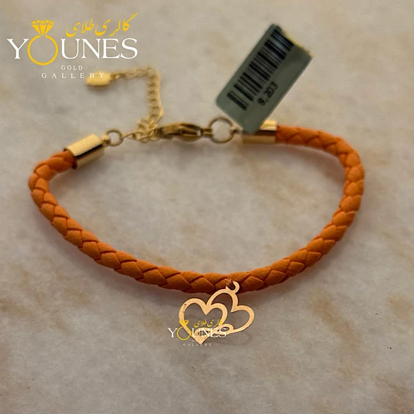 دستبند چرم نارنجی قلبی بینهایت طلا